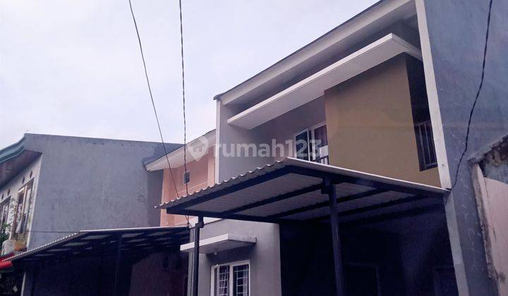 Rumah di jual dua lantai melalui lelang dan as is di Perum graha Bintaro jaya blok gr 26 Kel Parigi baru pondok aren Tangerang selatan Banten  2