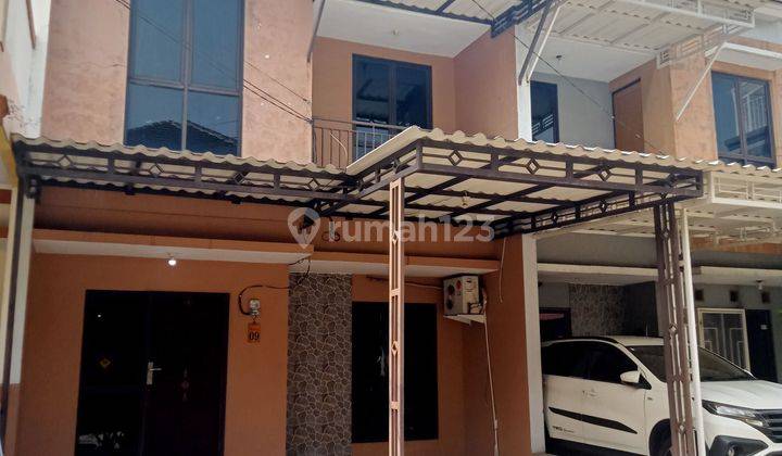 Rumah dua lantai di jual melalui lelang dan as is di Permata lcon cluster jade blok A.2 no 9 desa karet Sepatan Tangerang Banten .. 1