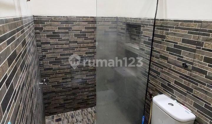 For Sale: Well-Maintained, Ready-to-Live-In House with Spacious Kitchen, 1.5 Floors, Fully Grilled, in Taman Kopo Katapang. 2