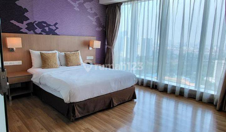 kamar tidur apartemen mewah di kuningan di