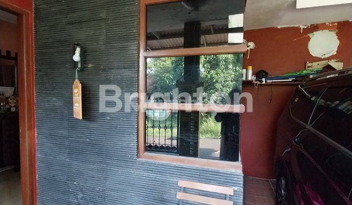 RUMAH  DI LINGKUNGAN ASRI DI PANCORAN DEPOK 2