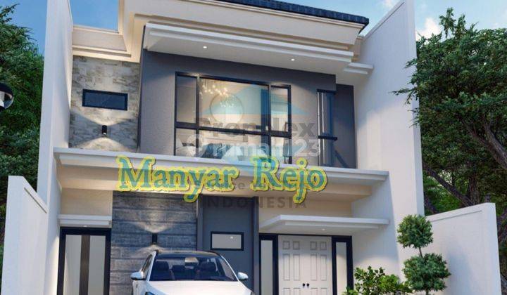 Rumah minimalis Tengah kota Manyar 1