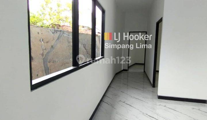 Dijual Rumah Cantik Minimalis Modern di Jl. Nawang Sari Semarang Utara 11.800 aud  2