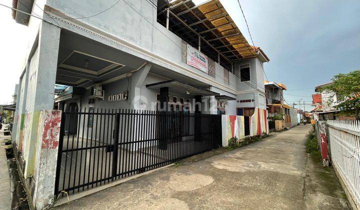 jual rumah beserta kos kosan 10 pintu area radial  2