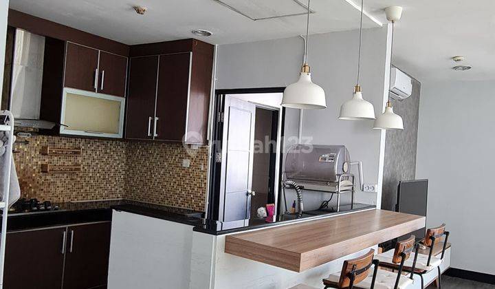 ruang makan essence darmawangsa apartment 3 br