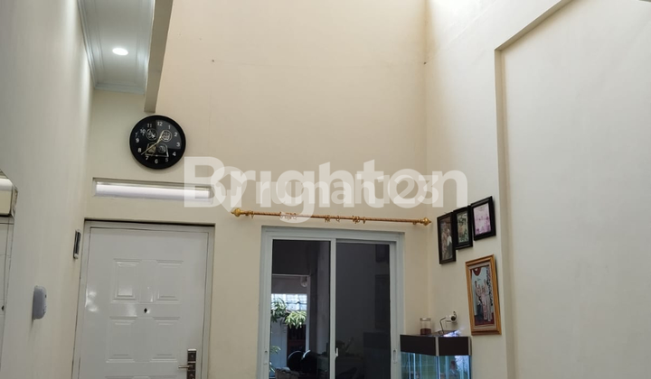 Rumah Siap Huni dengin Rooftop di Perumahan Taman Royal  2