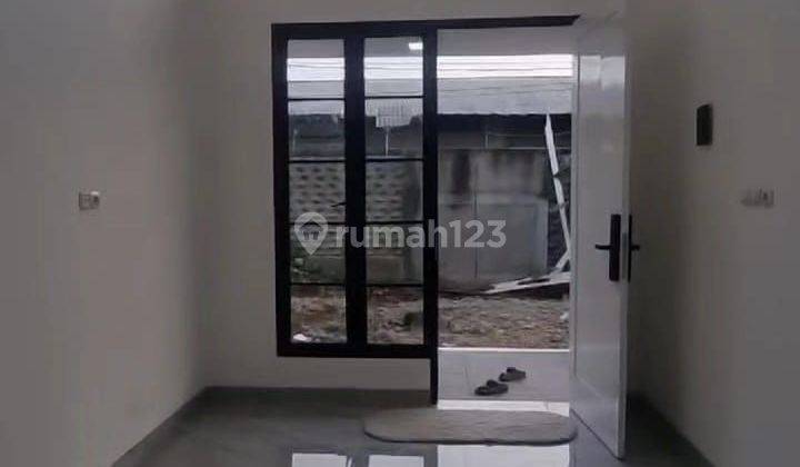 Rumah 1 lantai terasa 2 lantai di pinggir jalan raya parung 2