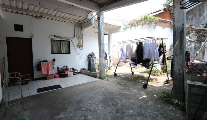 TANAH LUAS STRATEGIS DENGAN RUMAH KOST DI KARET KUNINGAN, DEKAT MRT BENHIL, SCBD, SUDIRMAN 2