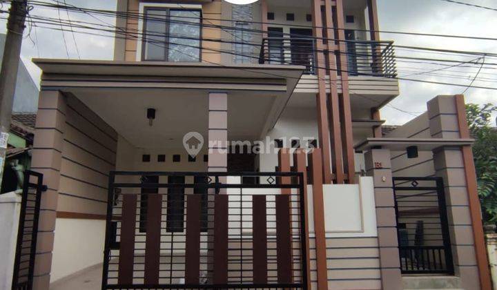 Rumah 2 lantai Lt 112.5 m split level  siap huni di Bsd 1