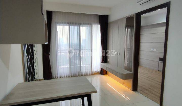 M Town Signature Apartemen Tower Herald 1