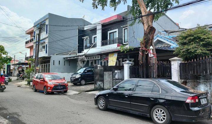 Rumah Hitung tanah di pinggir jalan utama di Harapan Indah 2