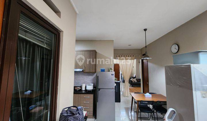 Rumah 1 1/2 lantai cantik dan siap huni di Kota Harapan Indah 2