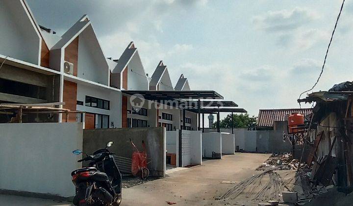 Rumah  Mewah Modern Dalam Mini Cluster Bintara 14 Bekasi Barat
 1