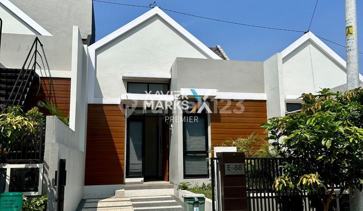 Modern Minimalist New House One Step from Malang Toll Exit at Riverfront, Malang