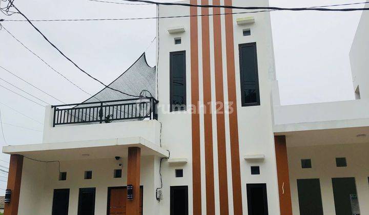 Rumah murah rumah 2 lantai rumah minimalis modern rumah baru di  Jl. Ciater Wareng, RT.01/RW.013 des, Rawakalong, Kec. Gn. Sindur, Kabupaten Bogor, Jawa Barat 16540 SHM Timur 1