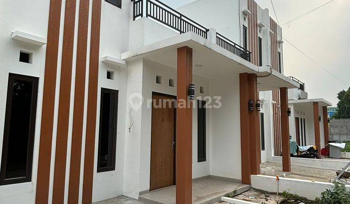 Rumah murah 2 lantai rumah baru minimalis modern di  Jl. Ciater Wareng, RT.01/RW.013 des, Rawakalong, Kec. Gn. Sindur, Kabupaten Bogor, Jawa Barat 16540 Rumah Baru SHM 2 Lantai 1