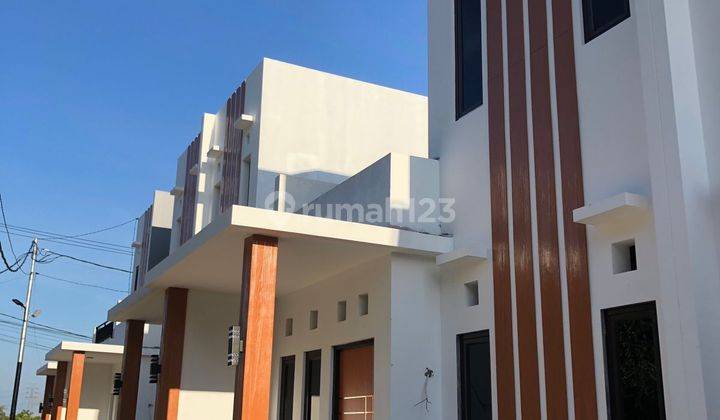 Rumah murah 2 lantai minimalis modern di  Jl. Ciater Wareng, RT.01/RW.013 des, Rawakalong, Kec. Gn. Sindur, Kabupaten Bogor, Jawa Barat 16540 Rumah 2 Lantai SHM Baru Timur 2