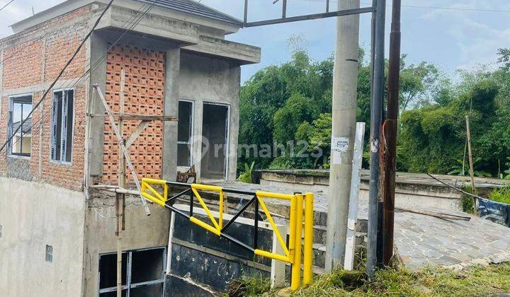 Rumah Minimalis Model Downslope Pasir Impun Atas 2