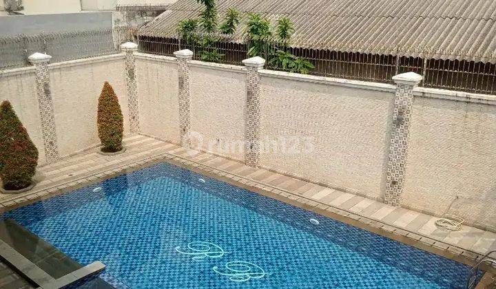 Rumah Permata Timur Pondok Kelapa 2 Lt, Lt 560 M2, Kolam Renang 2