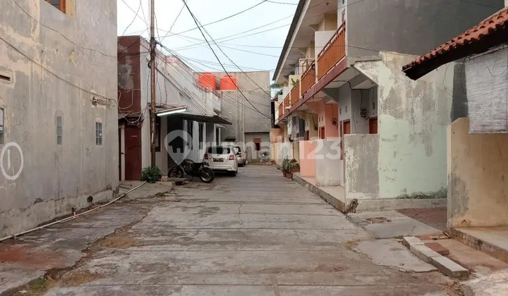 Tanah Pondok Kelapa Ada Kontrakan 140 + Ruko 8, Jln Raya, Harga Dibwh NJOP