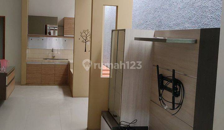 rumah minimalis siap huni di taman holis indah 2 1