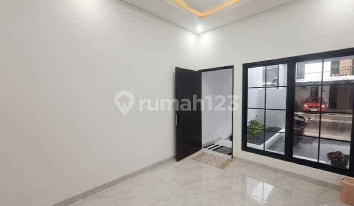 Rumah Bagus Modern Tropis Smart Home di Graha Raya Bintarora 2