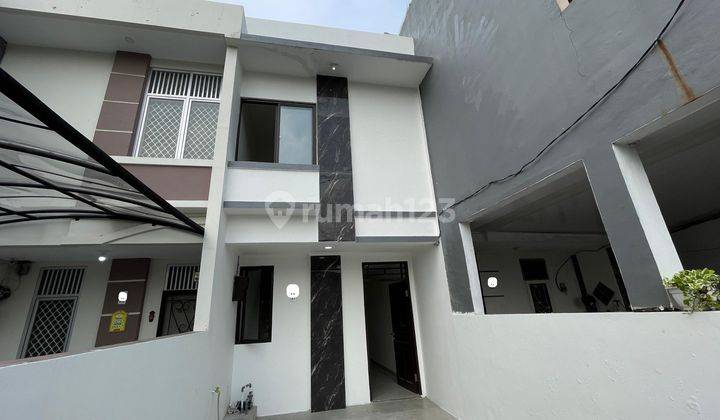 RUMAH 2 LANTAI TAMAN PALEM NEW 1