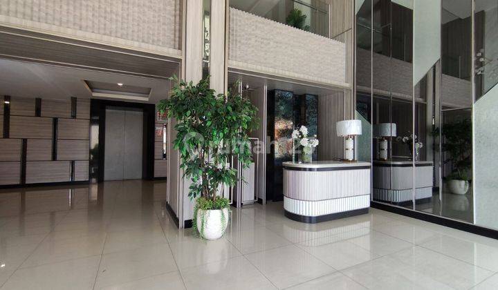 2 BR - Luas 56 m² Apartemen Puncak Dharmahusada Tower C  1