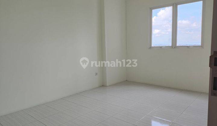 2 BR - Luas 56 m² Apartemen Puncak Dharmahusada Tower C  2