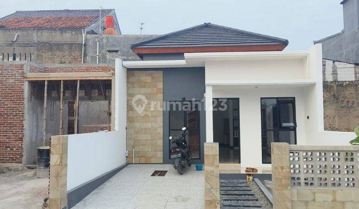 Rumah modern minimalis dekat jalan raya provinsi 1