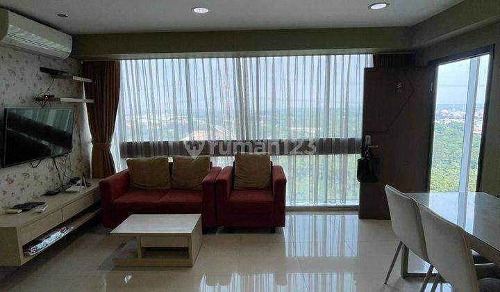 ruang tamu 2 bedroom tamansari hive apartemen