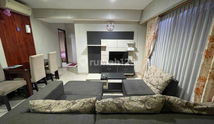 ruang tamu 2 bedroom tamansari hive disewakan