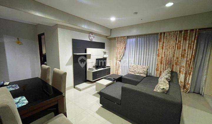 ruang tamu 2 bedroom tamansari hive disewakan