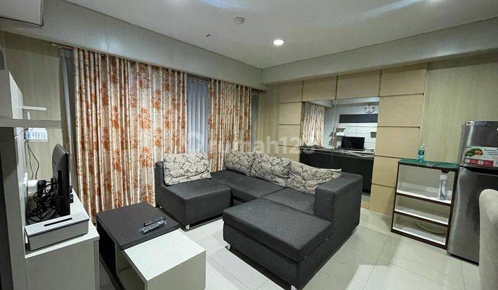 ruang tamu 2 bedroom tamansari hive disewakan