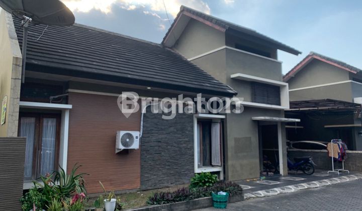 SOLO, GENTAN: HOUSE WITHIN A HOUSING ESTATE 2