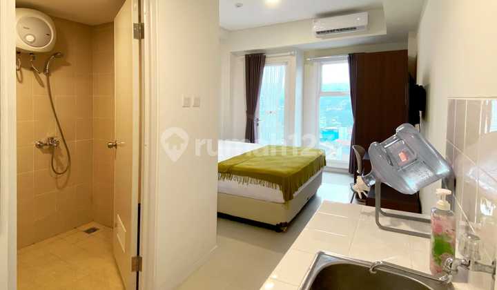 In front of Unpar, Parahyangan Apartment, furnished residence.