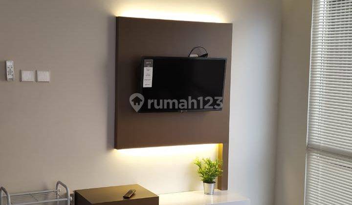 ruang keluarga apartemen breeze tower bintaro jaya