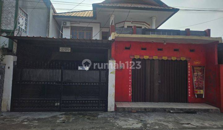 Dijual Rumah + kamar kost + toko di Kramat jati, Jakarta Timur Bagus 1