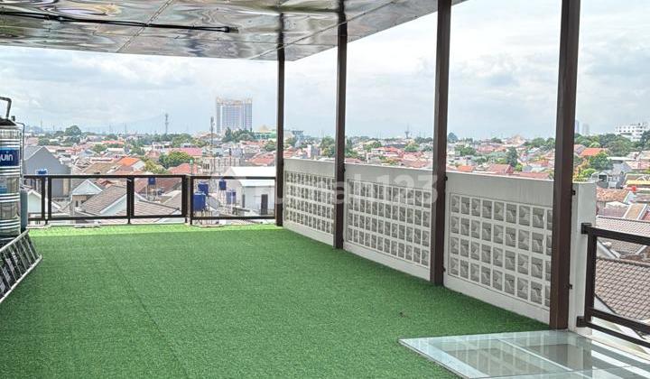 Rumah 4 Lantai Rooftop Kolam Renang Pribadi Luas 160M SHM Depok 2