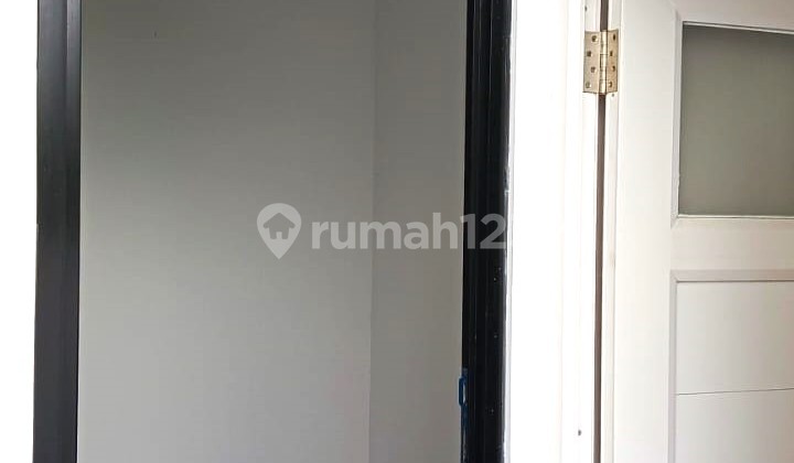 Rumah Brand New Desain American Classic 2 Lantai di Tanah Baru  2