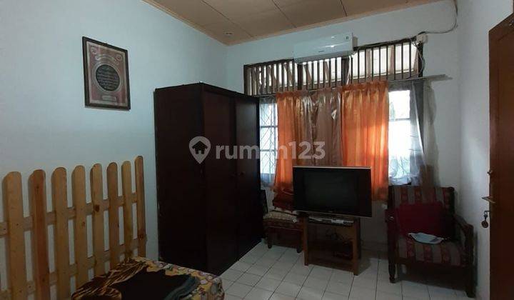 ruang keluarga rumah dijual dalam komplek malaka