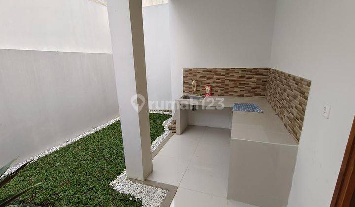 Di kontrakan rumah baru 2 lantai di Bali Garden Awiligar. Rumah siap huni terawat lingkungan sejuk dan asri 1