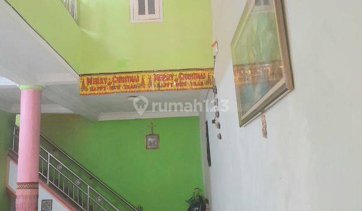 Rumah Asri  2 Lantai Di Taman Griya Kencana 2