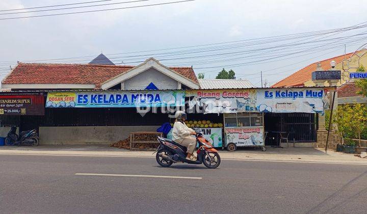 RUMAH DIPINGGIR JALAN RAYA, COCOK UNTUK USAHA 1