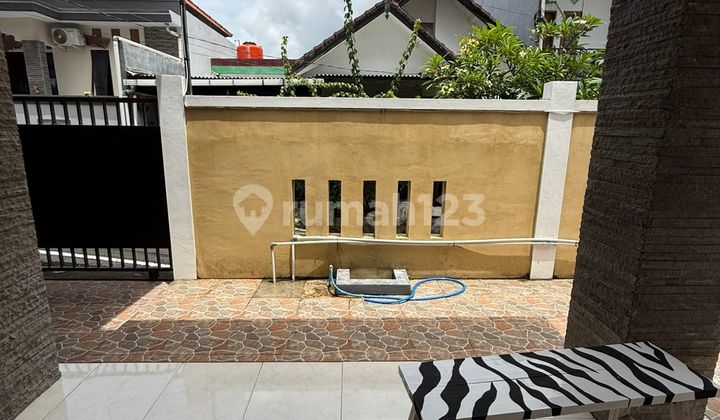 Rumah Minimalis Lantai 1 di Taman Griya Jimbaran W
