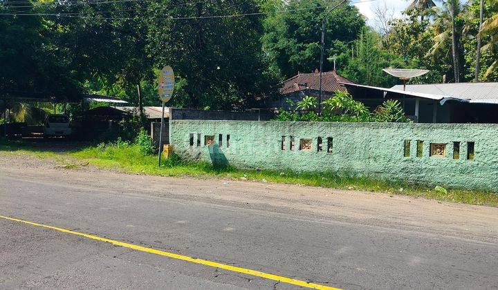 LAND ON THE SINGARAJA-AIRSANIH POROS ROAD 1