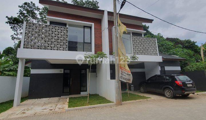 Rumah Minimalis Modern 2 Lantai Teras Grandwhiz 1