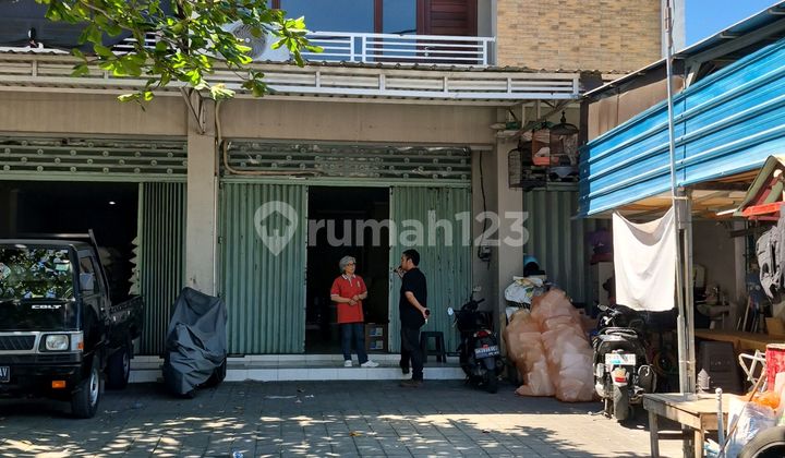 Translation: "For Rent: 2-Story Shop House, Strategically Located on Main Road, West Denpasar" 2