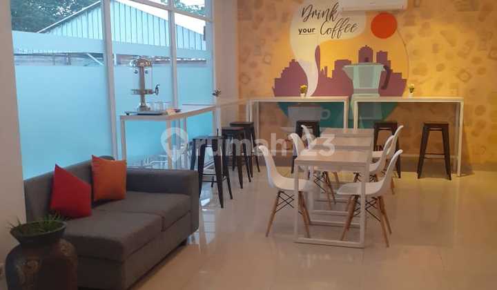 Central Front One Inn Hotel, located on Jl Husein Sastranegara, Rawabokor, near Soetta Airport. A budget hotel (equivalent to 1-star) franchised with Azana Hotel Management. Land area approximately 450 m² including parking. 4-story building in good condition, building area approximately 820 m². 2