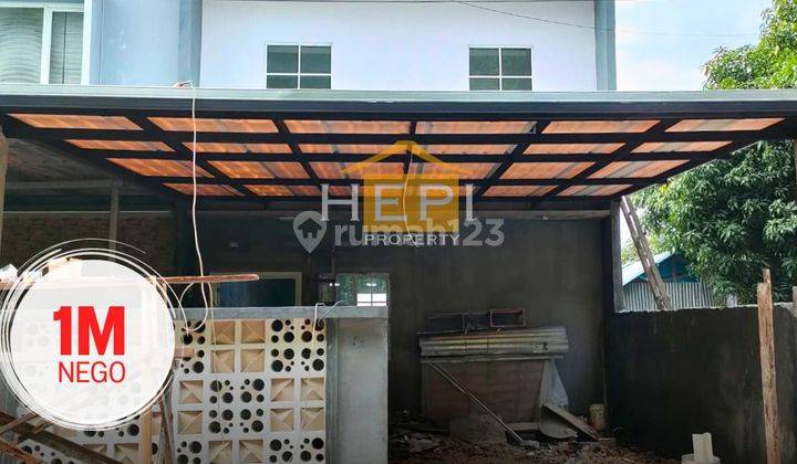 Rumah modern dengan pinggir kota dengan fasilitas bagus 1